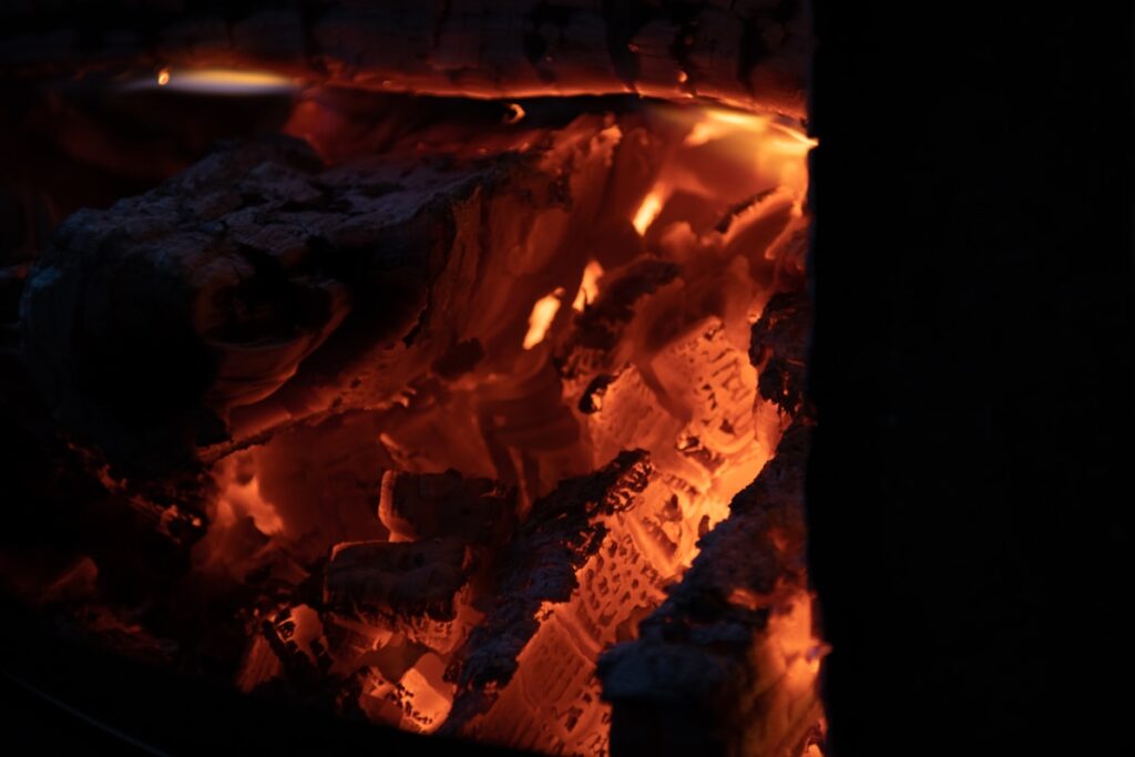 a close up of a fire burning in a fireplace