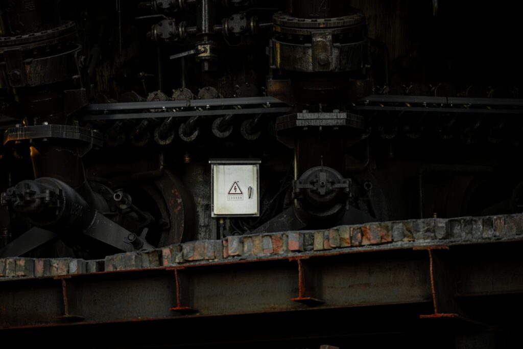 A train engine sitting on top of a train track