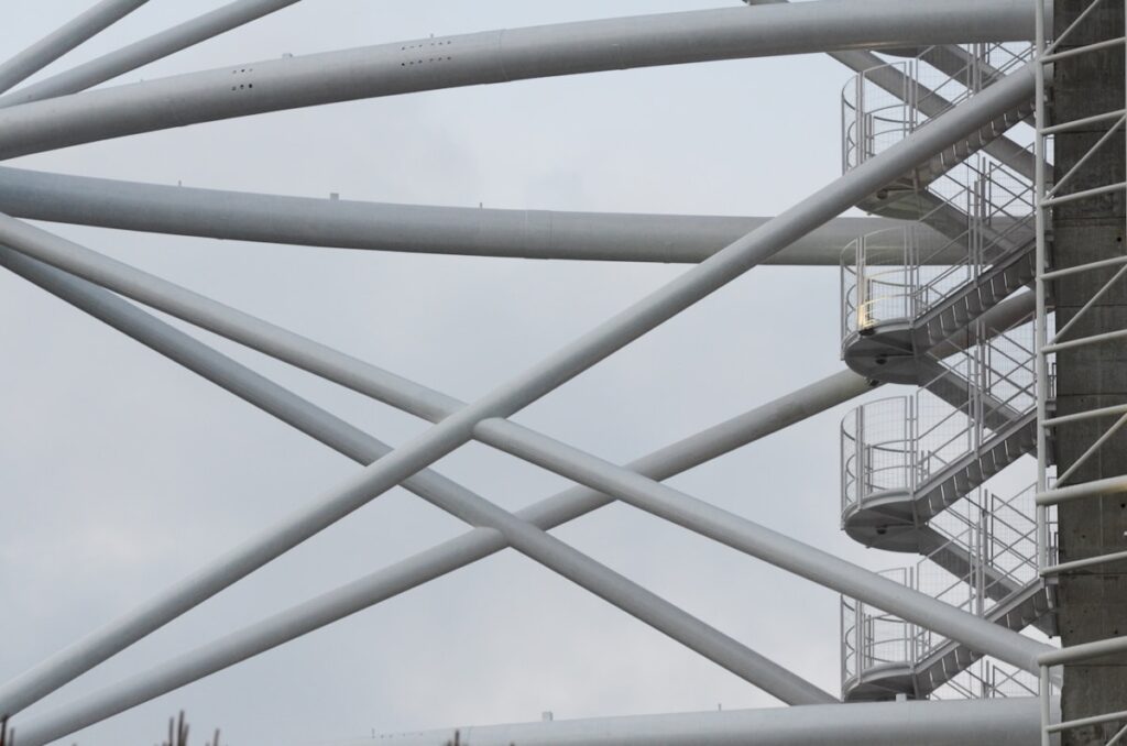White metal beams forming a geometric structure